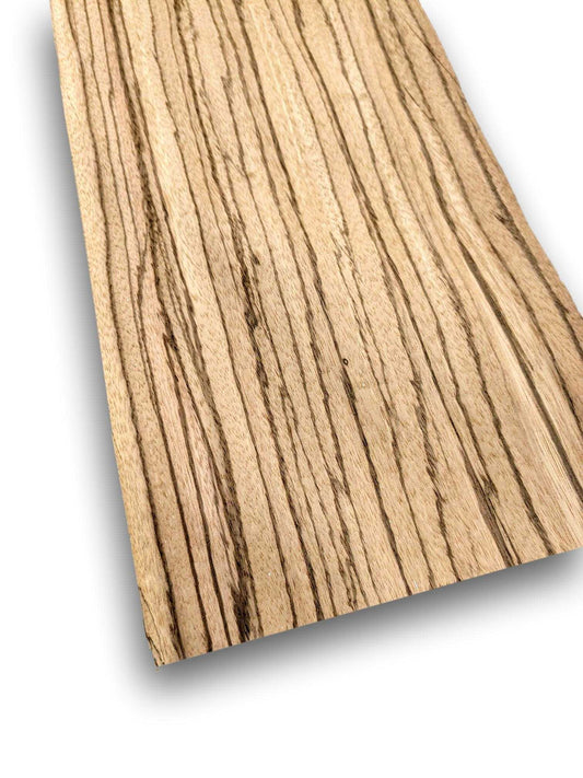 Zebrano houtfineer 100 x 19 cm met natuurlijke streeptekening, ideaal voor meubelbekleding of restauratieprojecten.